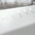 Soft-touch ignition with capacitive control on the edge of the tub